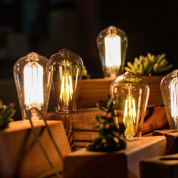 Ampoule LED bougie diffusant une lumière chaude et douce.