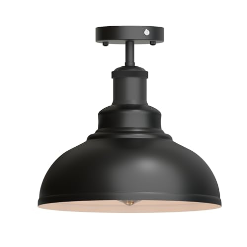 Luminaire cage vintage noir installé dans un salon style loft industriel