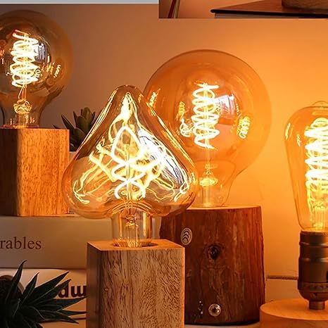 Ampoule bougie LED émettant une lumière chaude et douce.